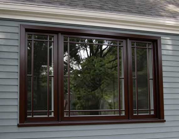 Bright interior room with two arched white-framed windows allowing natural light and outdoor views, highlighting elegant design, energy efficiency, and professional Window Replacement Alpharetta services for modern homes.