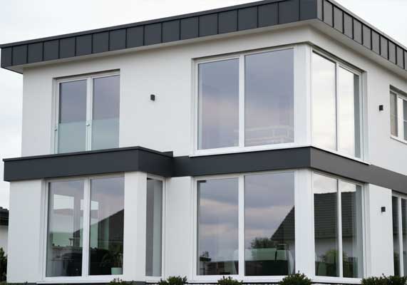 Window Replacement Dallas GA showcasing modern large-pane replacement windows installed on a contemporary two-story home for improved natural light and energy efficiency