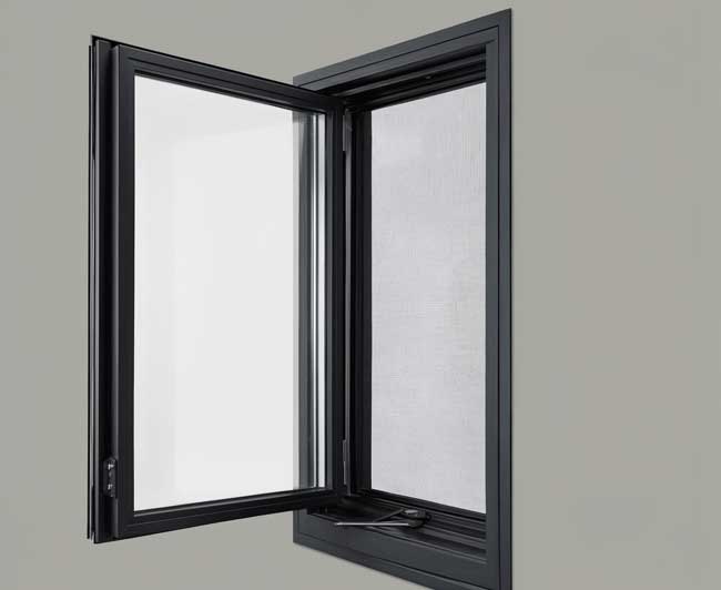 Interior bay window with white frames and decorative accents overlooking brick apartment buildings, enhancing natural light and city views while showcasing professional Window Replacement Atlanta services for modern, energy-efficient homes.